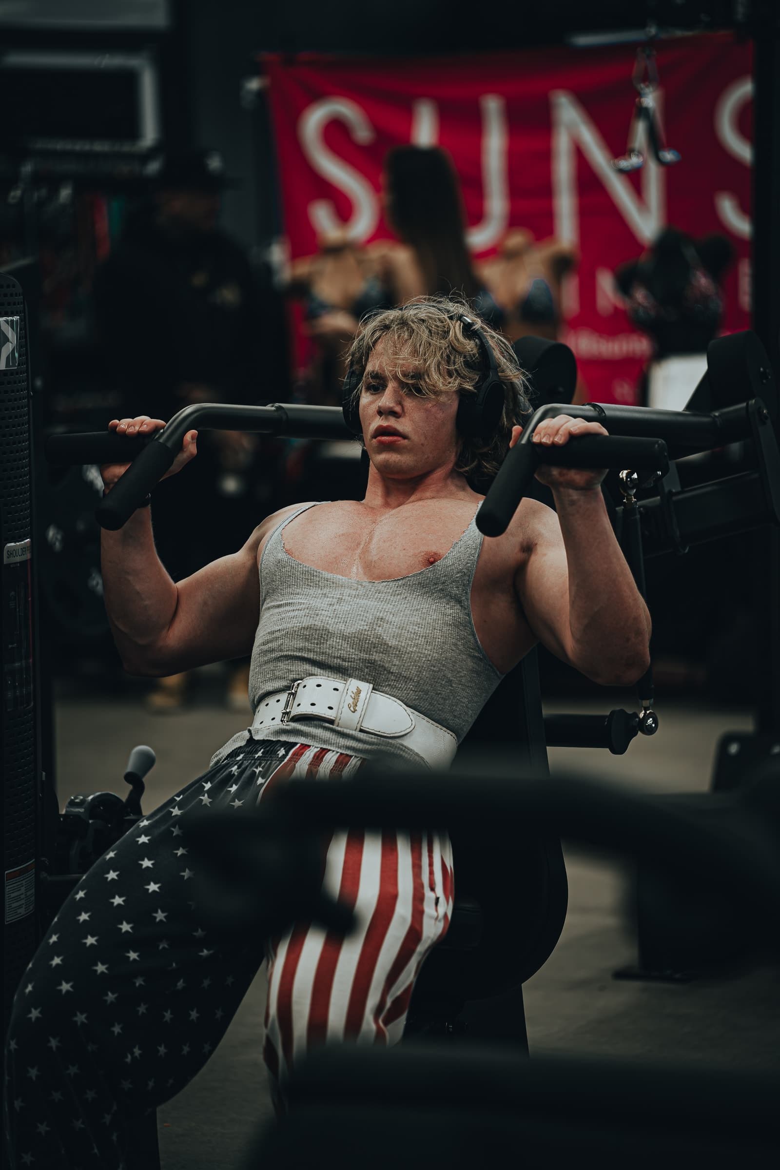 Athlete training on a gym machine